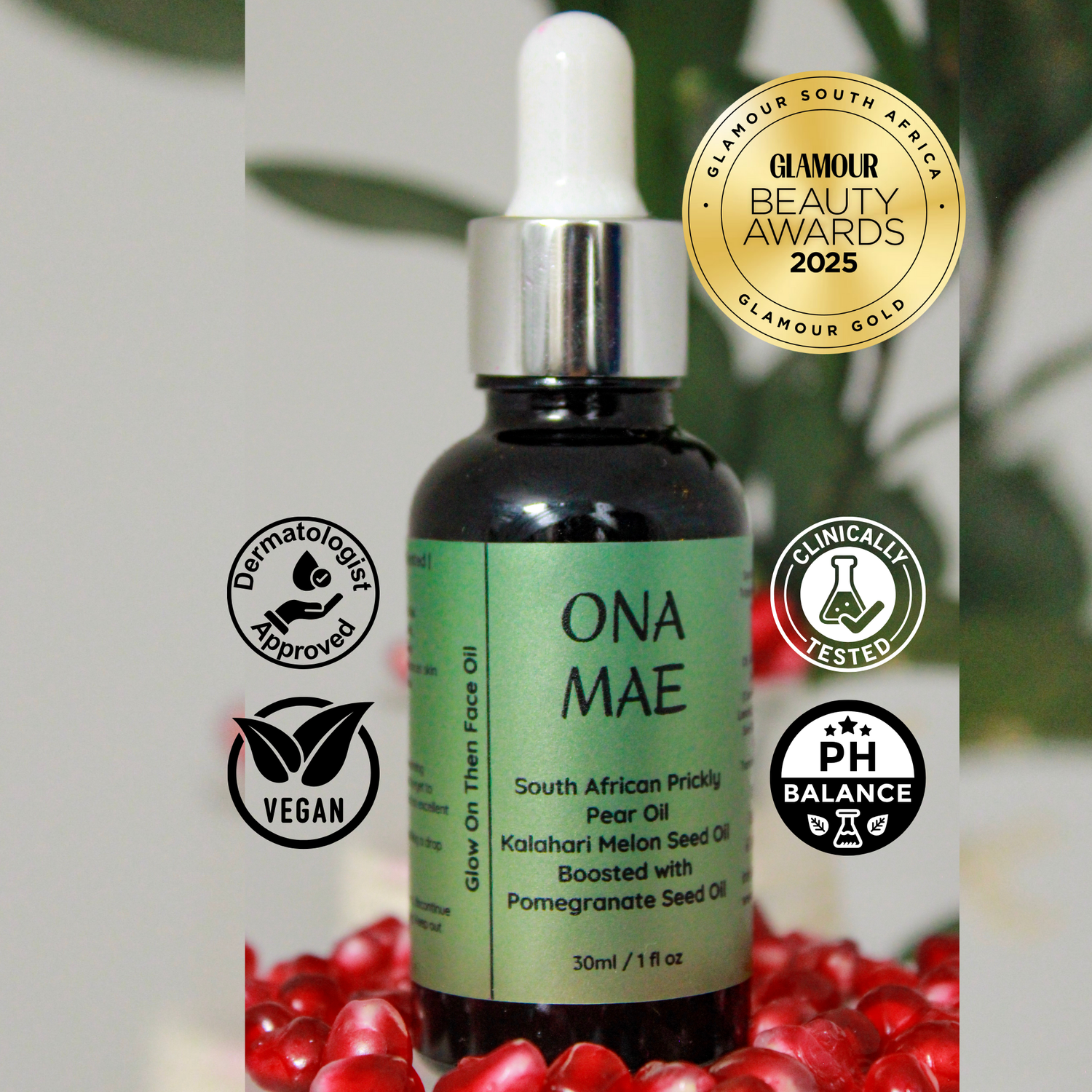 ONA MAE skincare oil bottle with Glamour awards and certification logos on a blurred natural background