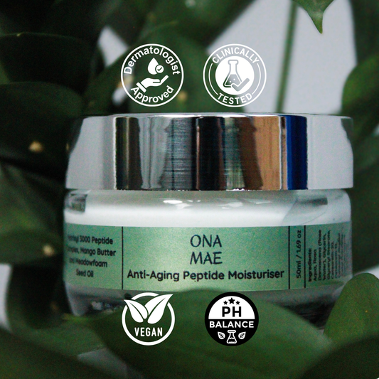 Ona Mae anti-aging peptide moisturizer jar with various certification logos on a green leafy background