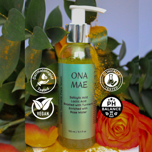 Ona Mae Golden Turmeric facewash with green label and pump, surrounded by flowers and leaves.